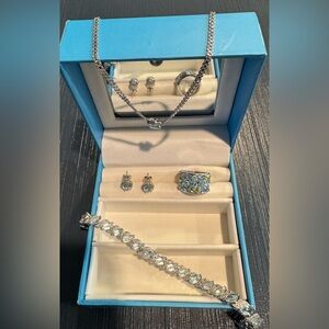 Ice Blue Topaz, Peridot & Diamond collection of elegant silver jewelry